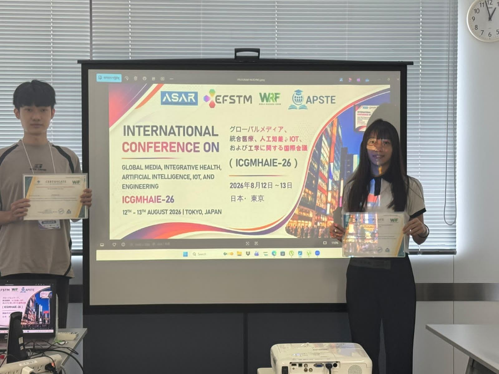 Authors with certificates at a JSIC conference